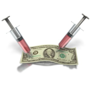 Syringe In Money PowerPoint clipart graphic preview.