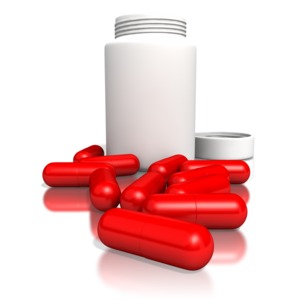 Blank Pill Bottle With Red Pills PowerPoint clipart graphic preview.