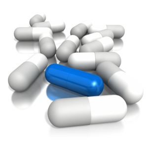 Pills On Ground One Blue Pill PowerPoint clipart graphic preview.