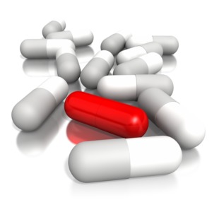 Pills On Ground One Red Pill PowerPoint clipart graphic preview.