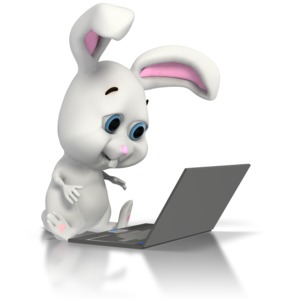 Easter Bunny Sitting at Laptop PowerPoint clipart graphic preview.