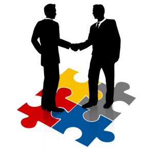 Businessmen Shake Hands Puzzle PowerPoint clipart graphic preview.