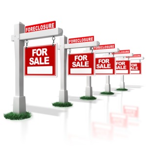 Multiple Real Estate Foreclosure Signs i PowerPoint clipart graphic preview.