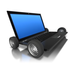 Computer Laptop Wheels PowerPoint clipart graphic preview.