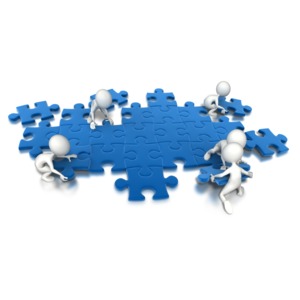 Puzzle People Working Together PowerPoint clipart graphic preview.