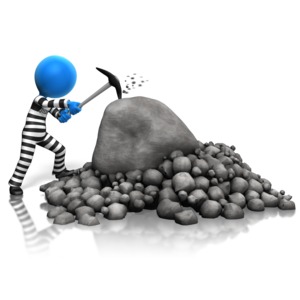 Inmate Breaking Rocks PowerPoint clipart graphic preview.
