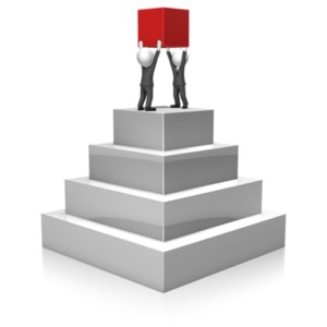 Businessmen Build Pyramid PowerPoint clipart graphic preview.