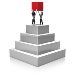 Business Women Build Pyramid PowerPoint clipart graphic preview.