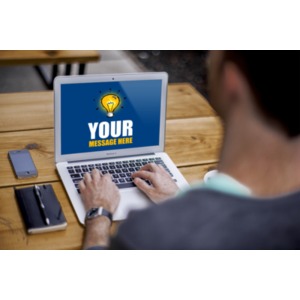Man Sitting On Laptop Customizable PowerPoint clipart graphic preview.